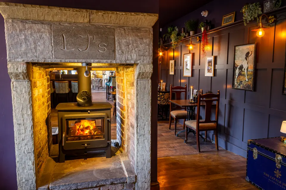 The snug at The Little John with the wood burner alight